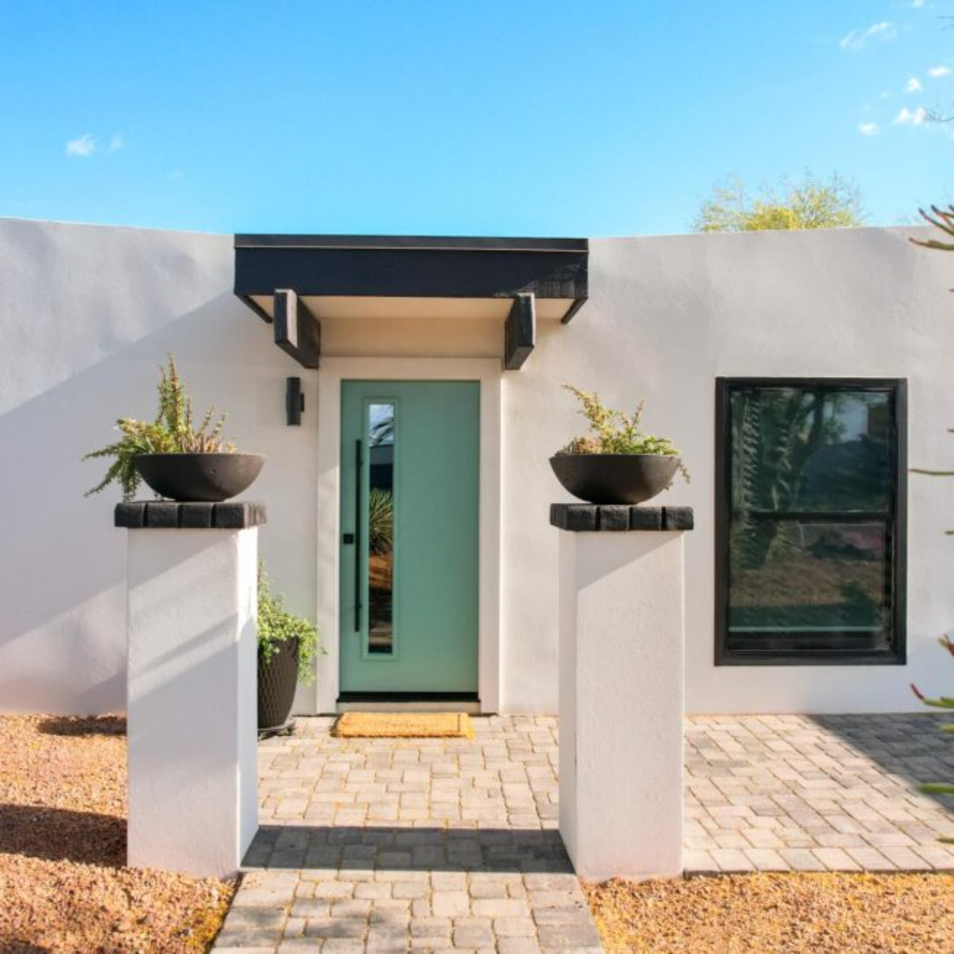 11 Mid-Century Modern Front Door Styles to Consider for Your Home 3 Legacy Smooth 111 Eucalyptus Black Square Pull Bar 652x652 1