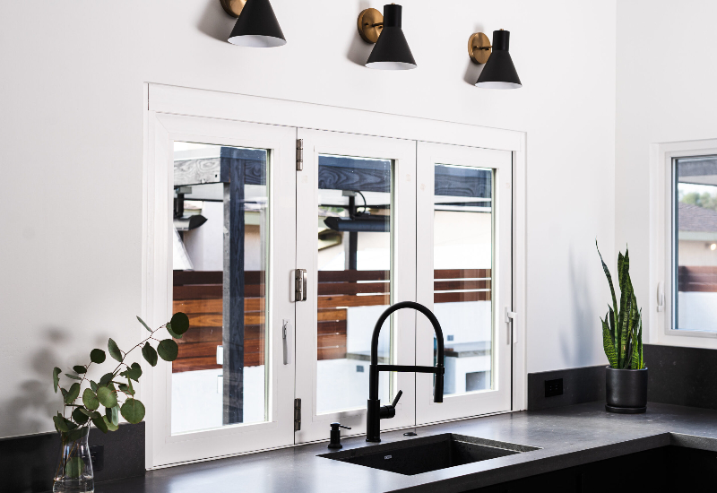 windor justin mcchcesney 12 3750 folding window black exterior white interior scaled 1