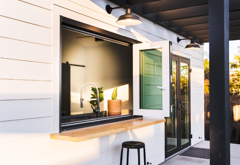windor justin mcchcesney 6 3750 folding window and french swing door black exterior 1 scaled 1